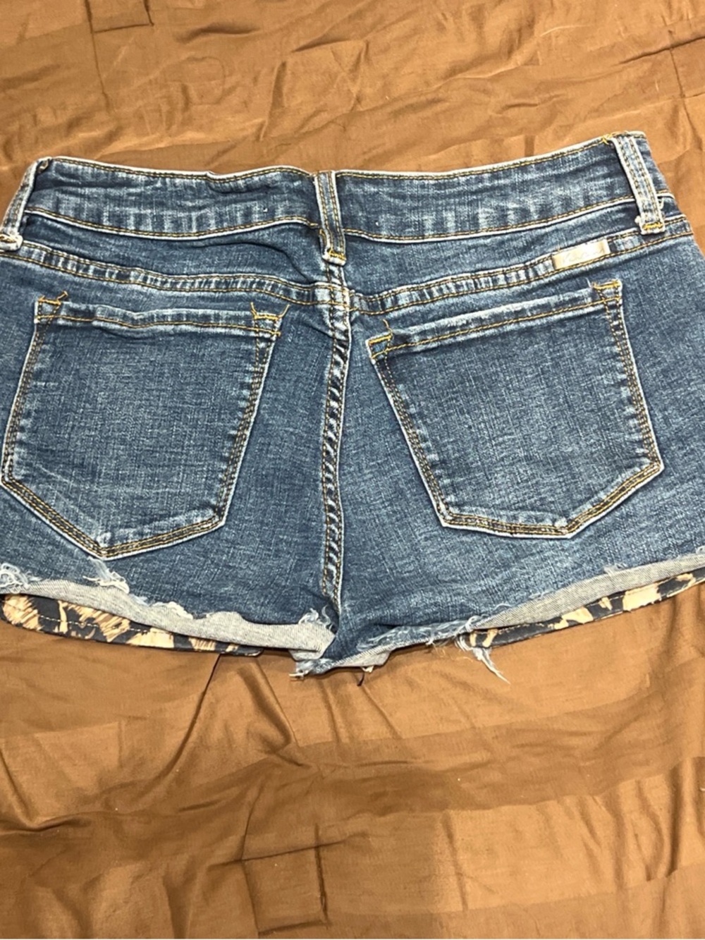 KanCan Blue Distressed Denim Shorts with Leopard Trim - Picture 2 of 2